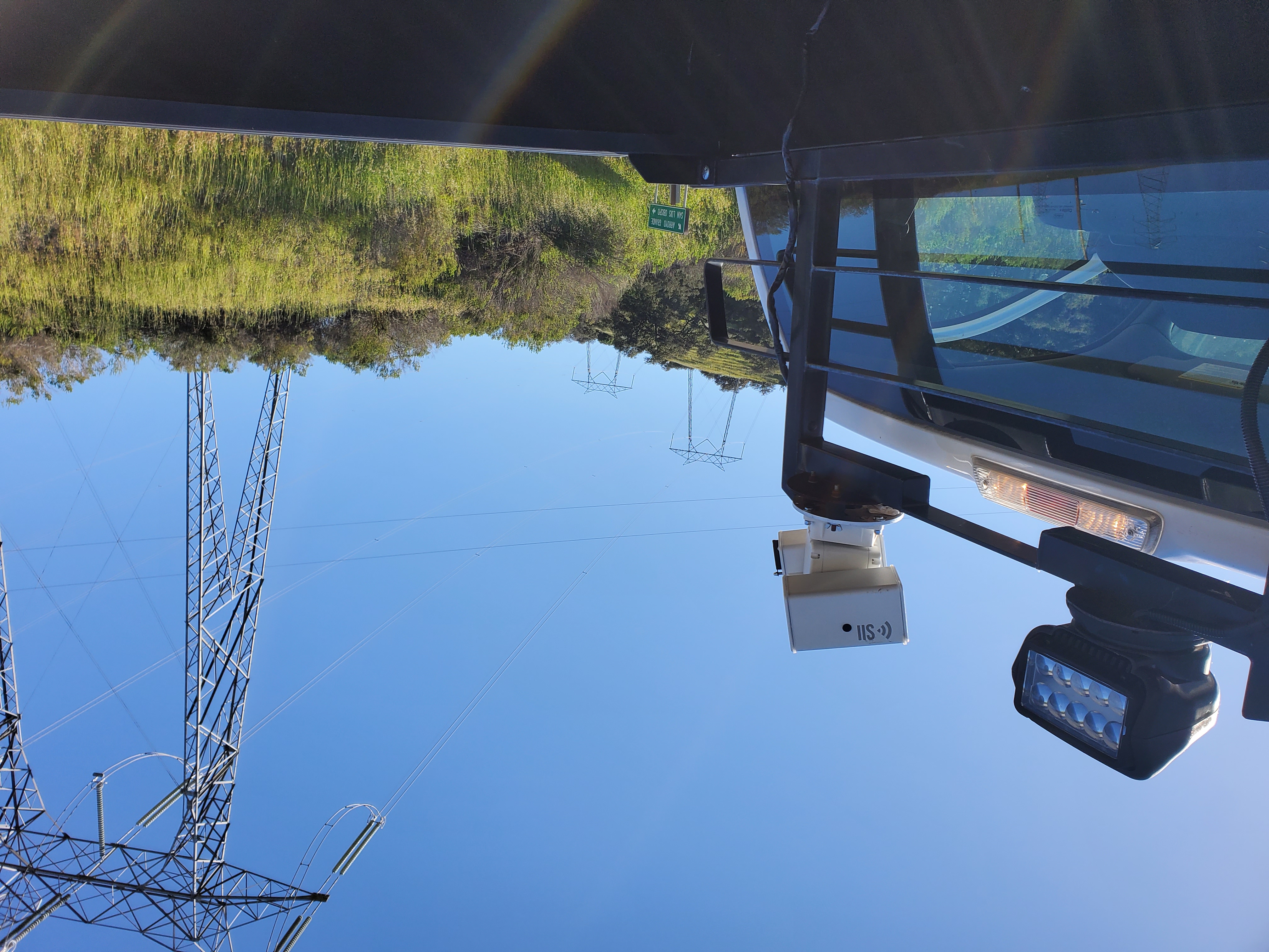 Mini PTZ mounted on an IIS truck, observing transmission lines.